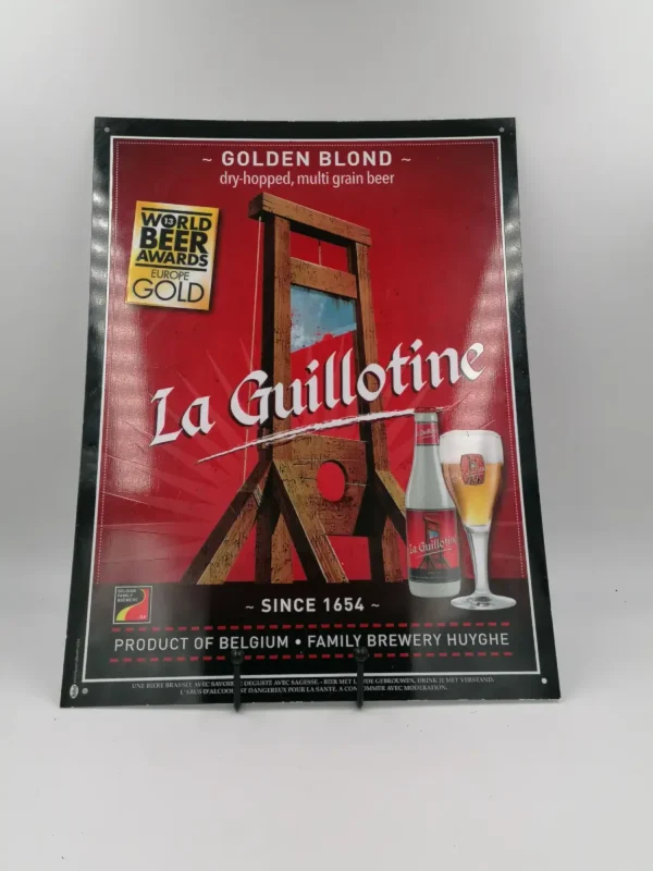 Plaque Publicitaire en plexiglass en bon état général de la marque de bière "La Guillotine".