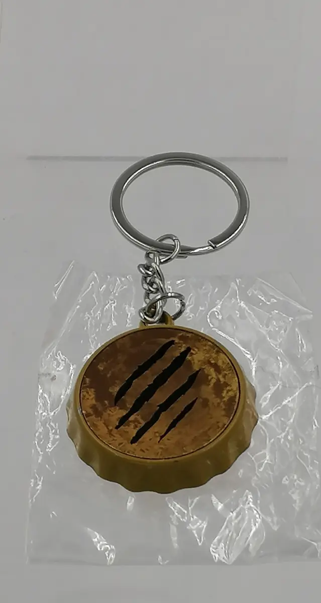 porte clé de la marque de bière la bête en métal neuf